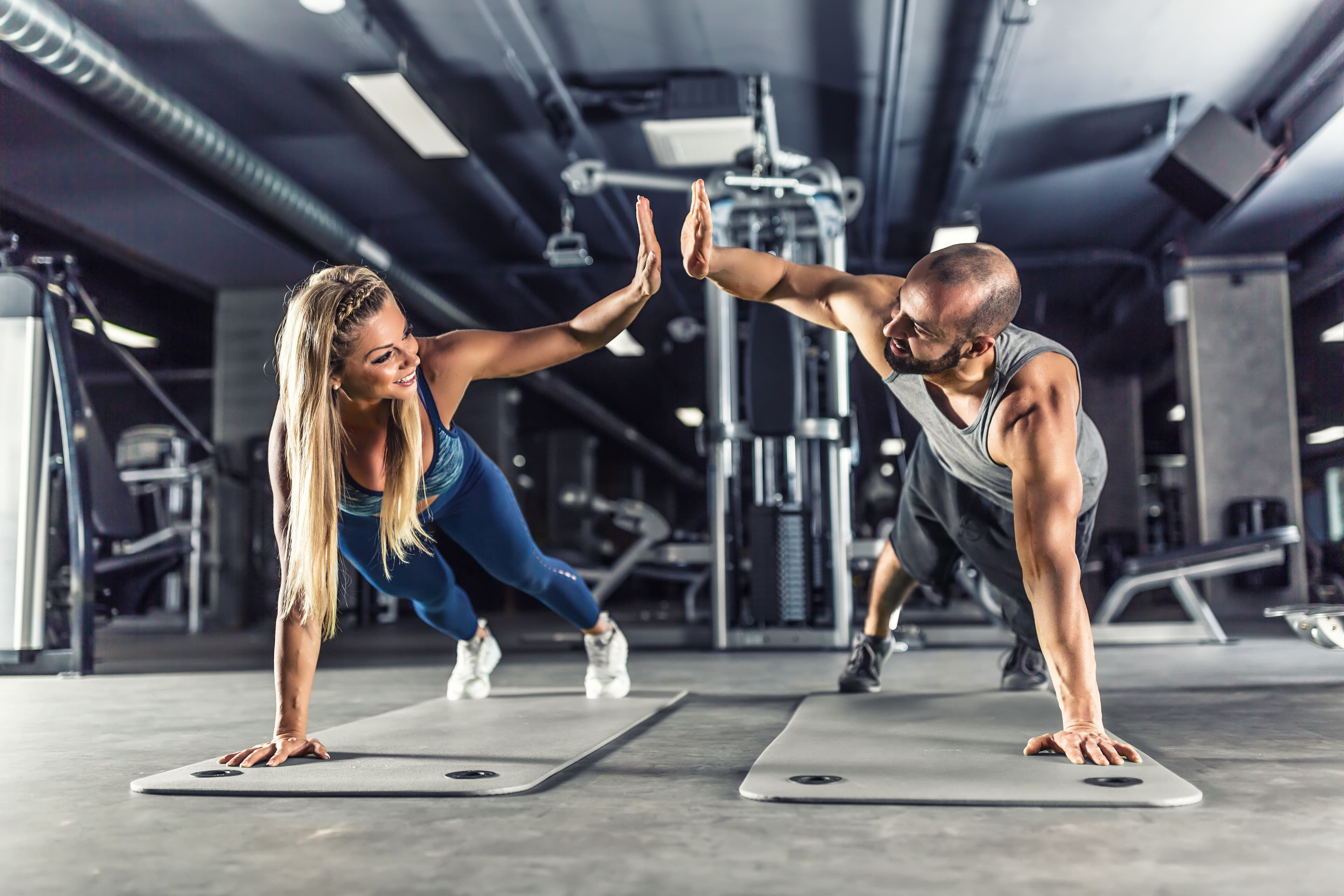 gym-members-doing-strength-training-at-affordable-fitness-facility